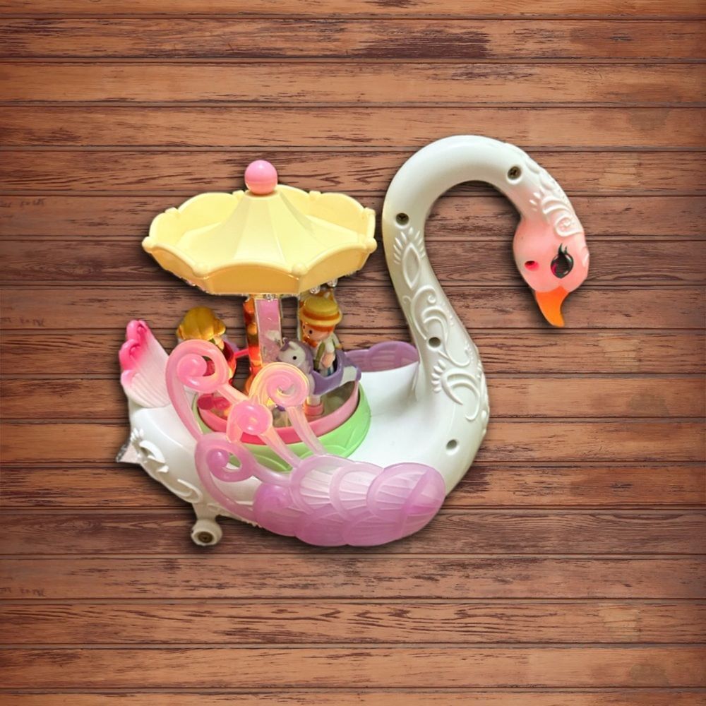 Swan Carousel Toy with Pink and Yellow Accents